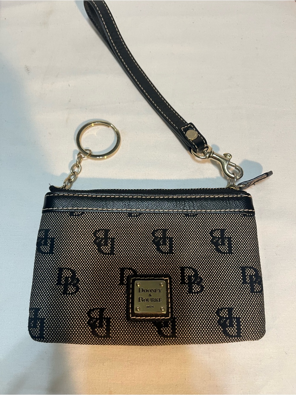 Dooney & Bourke Black and Tan Logo Wristlet with Gold Hardware